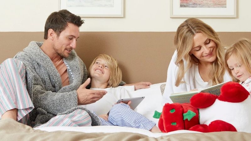 Family in Bedroom