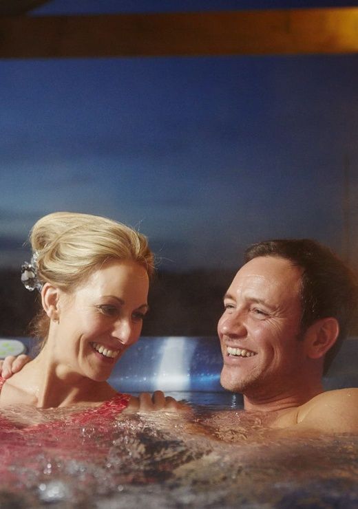 Hunter Lodges Hot Tub Couple