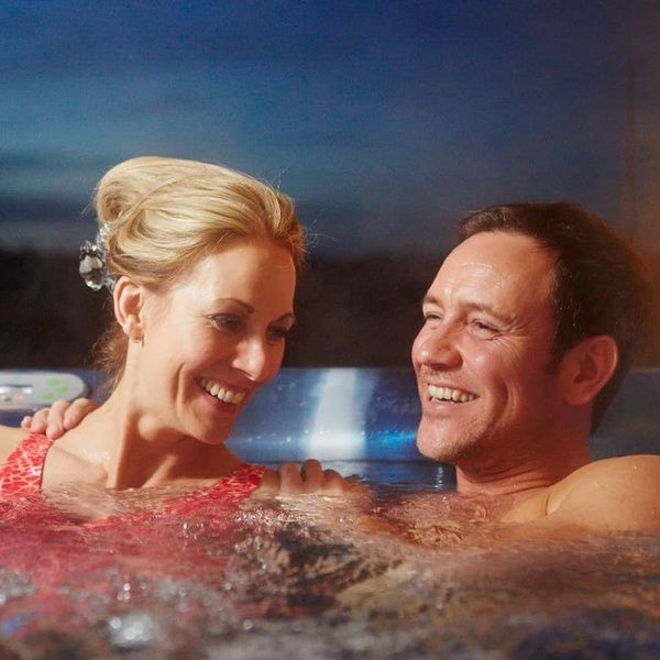 Hunter Lodges Hot Tub Couple
